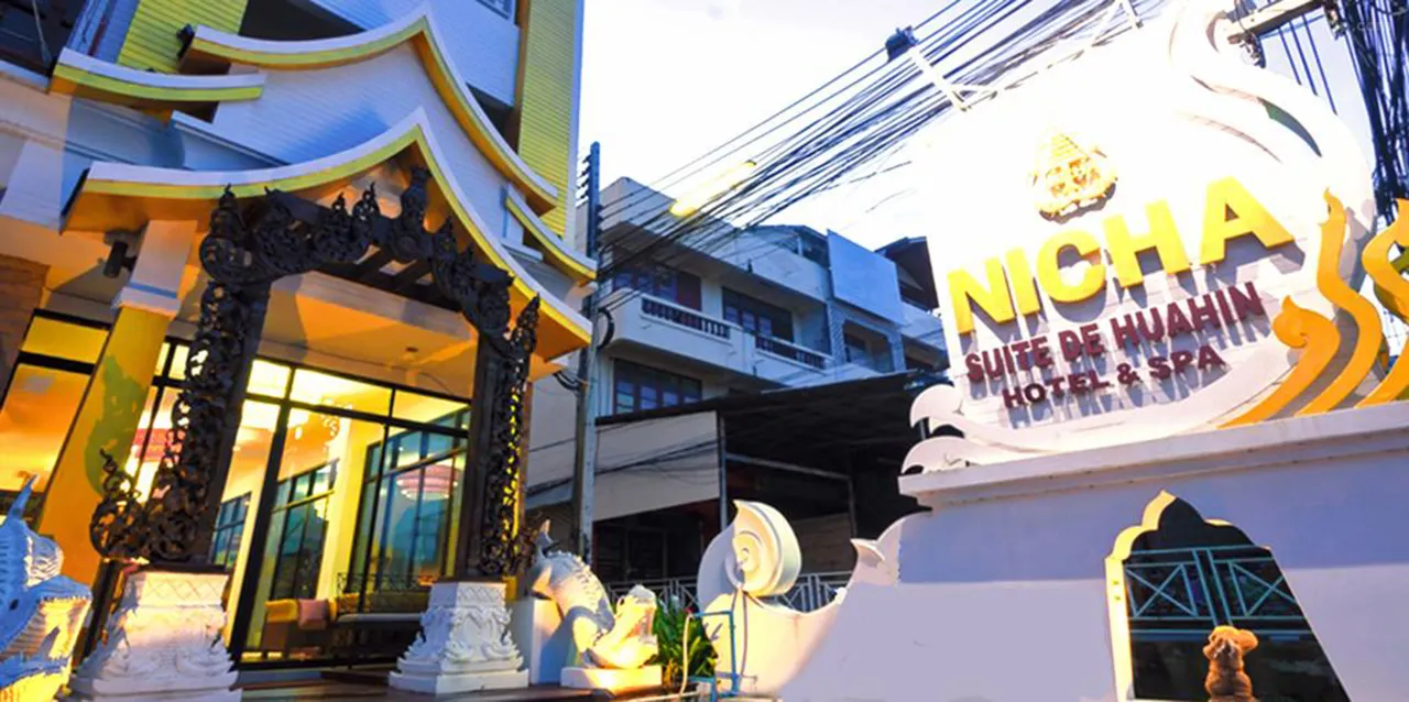 Wood-furnished rooms with modern amenities in Hua Hin